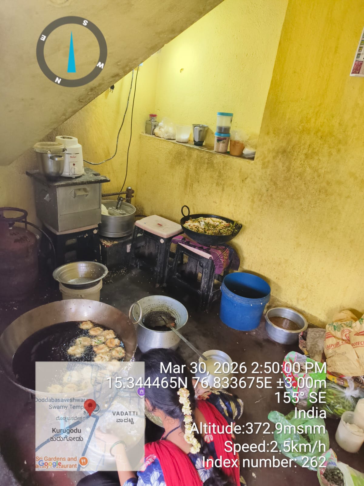 Behind the shop — the kitchen that feeds the road.